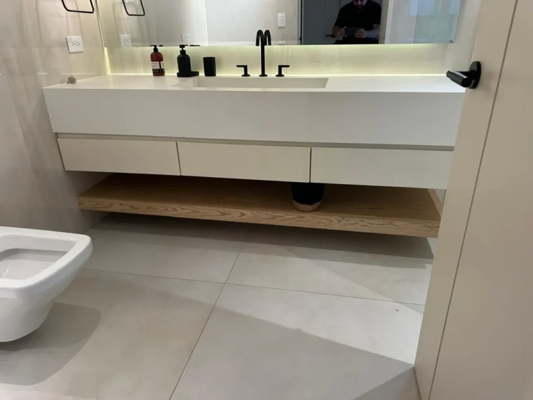 Floating vanity with oak shelf and backlit mirror, Escazú bathroom