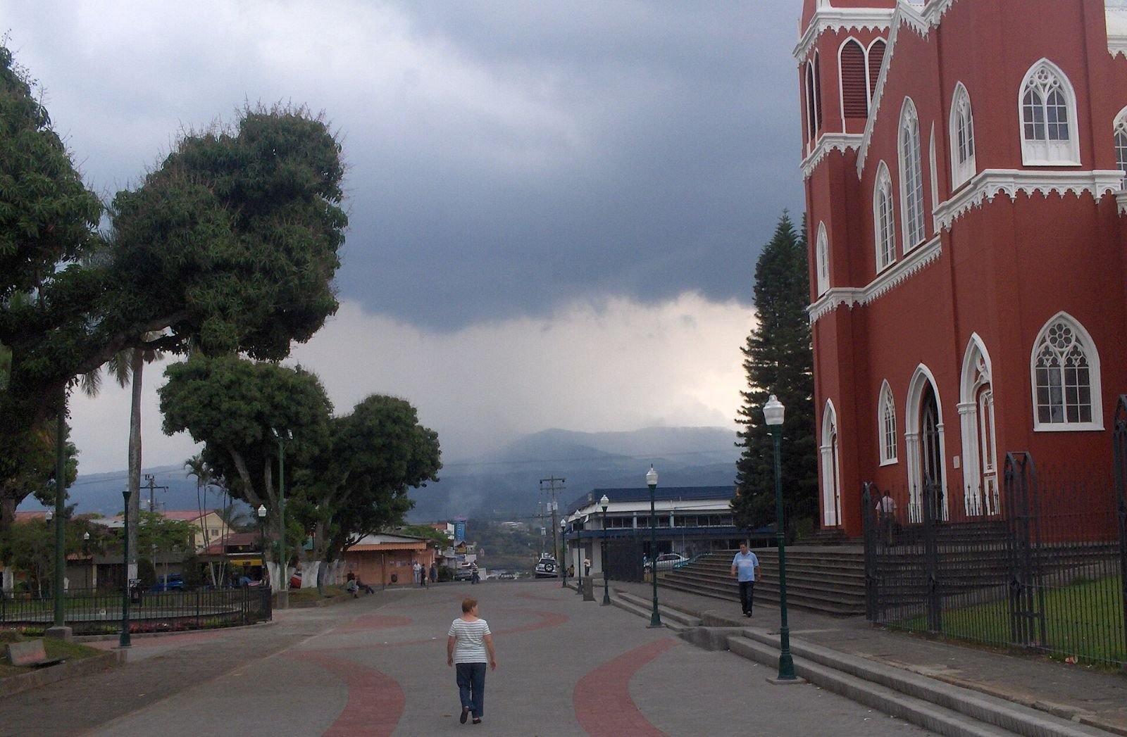 The boulevard beside Grecia's red metal church, the Parroquia de las Mercedes, in Costa Rica.